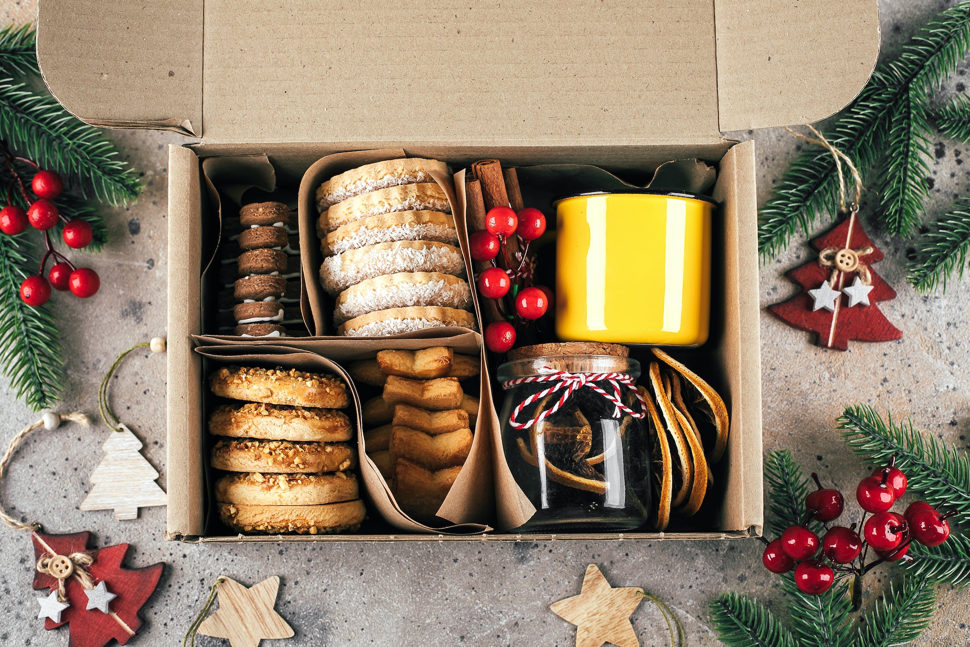 Christmas cookie gift box. Assorted shortbread cookies with holiday decoration.